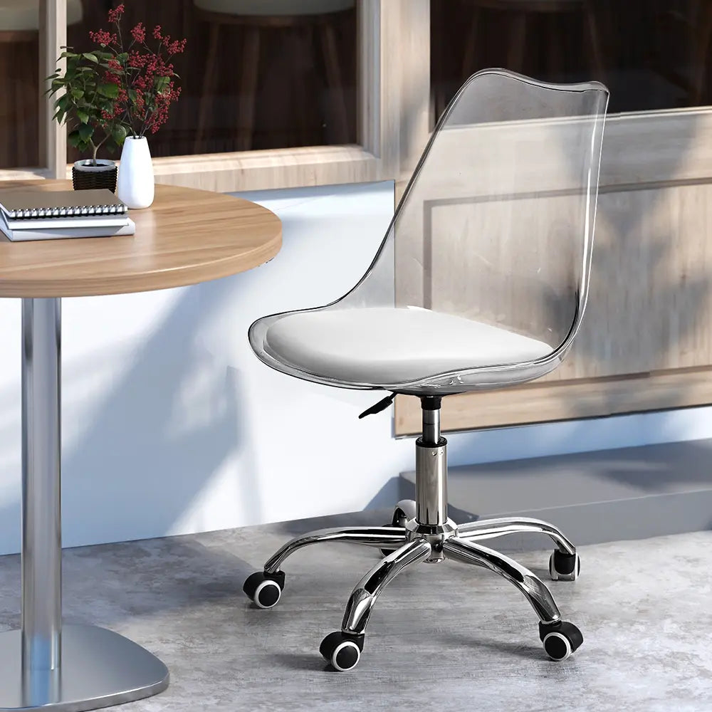 An elegant acrylic office chair with a minimalist design, showcasing a clear seat and a robust frame, perfect for any office setting.