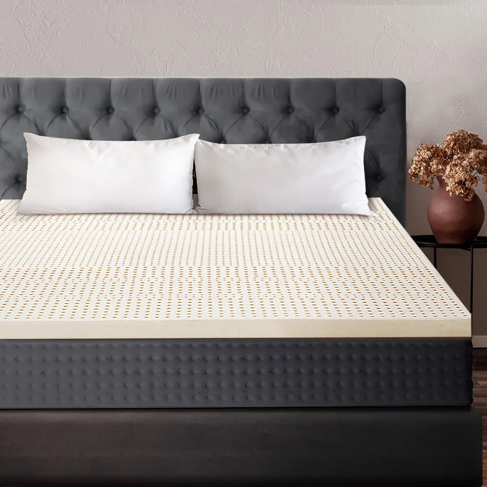 Durable and plush Lyric 50MM Latex Topper laid flat on a mattress