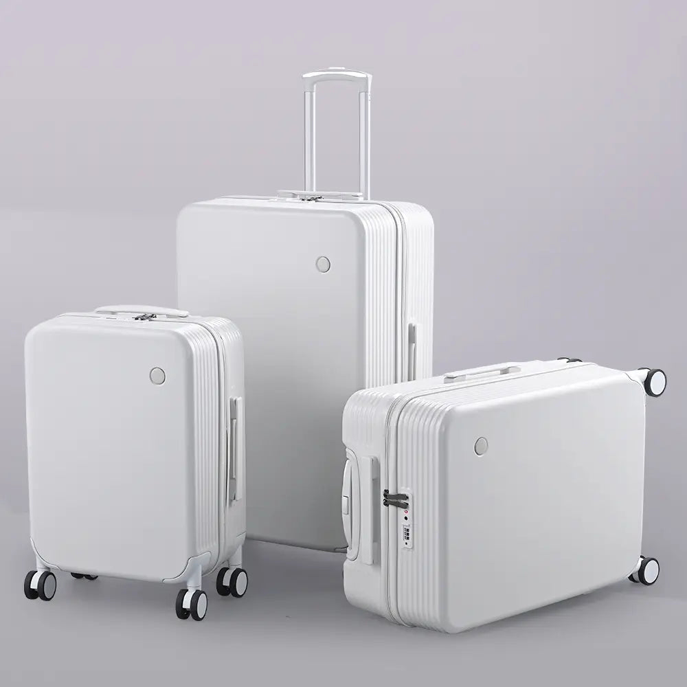 Balmain luggage set stacked with handles showing for easy transport