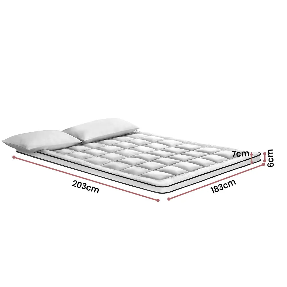 Breathable and plush Balmori topper adding comfort to a firm mattress