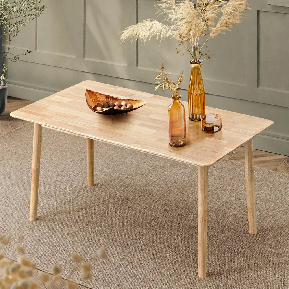 Barron dining table surrounded by chairs, ready for family dining